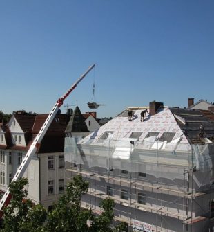 Takmålare i Stockholm: Hur takmålning faktiskt kan öka fastighetens värde